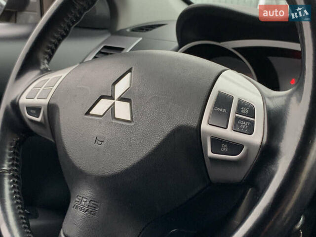 Черный Мицубиси Аутлендер ХЛ, объемом двигателя 2.4 л и пробегом 175 тыс. км за 10499 $, фото 39 на Automoto.ua