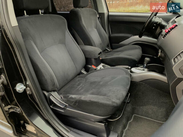 Черный Мицубиси Аутлендер ХЛ, объемом двигателя 2.4 л и пробегом 175 тыс. км за 10499 $, фото 34 на Automoto.ua