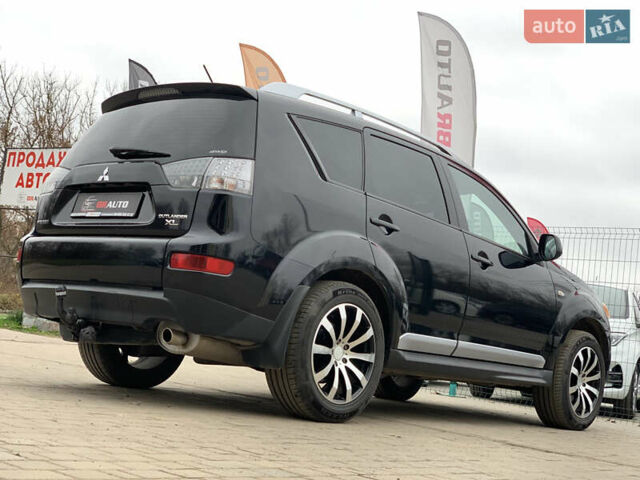 Черный Мицубиси Аутлендер ХЛ, объемом двигателя 2.4 л и пробегом 175 тыс. км за 10499 $, фото 13 на Automoto.ua