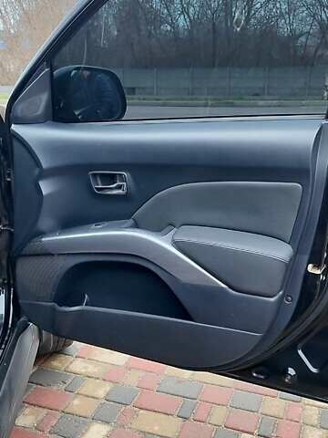 Чорний Міцубісі Аутлендер ХЛ, об'ємом двигуна 2.36 л та пробігом 150 тис. км за 11100 $, фото 18 на Automoto.ua