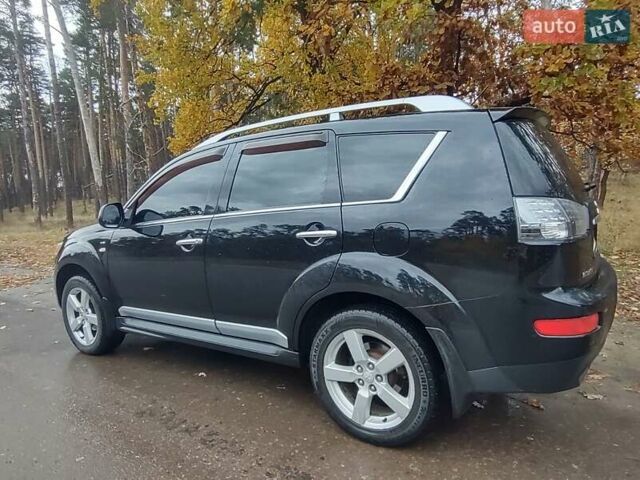 Черный Мицубиси Аутлендер ХЛ, объемом двигателя 3 л и пробегом 240 тыс. км за 9400 $, фото 4 на Automoto.ua