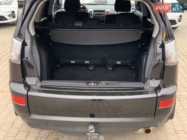 Черный Мицубиси Аутлендер ХЛ, объемом двигателя 2.4 л и пробегом 175 тыс. км за 10499 $, фото 27 на Automoto.ua