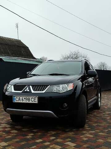 Чорний Міцубісі Аутлендер ХЛ, об'ємом двигуна 2.36 л та пробігом 150 тис. км за 11100 $, фото 3 на Automoto.ua