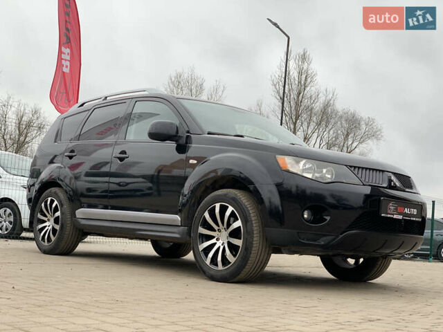 Черный Мицубиси Аутлендер ХЛ, объемом двигателя 2.4 л и пробегом 175 тыс. км за 10499 $, фото 5 на Automoto.ua
