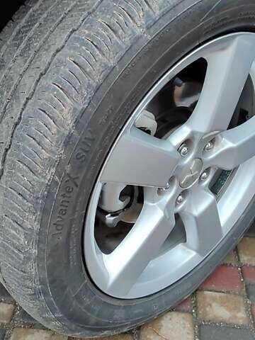 Чорний Міцубісі Аутлендер ХЛ, об'ємом двигуна 2.36 л та пробігом 150 тис. км за 11100 $, фото 10 на Automoto.ua