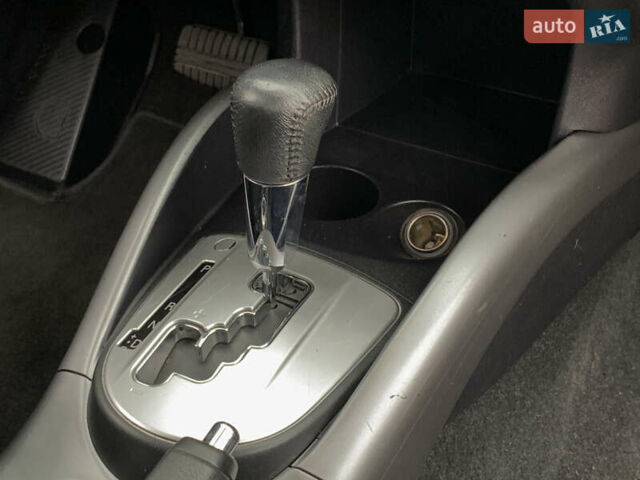 Черный Мицубиси Аутлендер ХЛ, объемом двигателя 2.4 л и пробегом 175 тыс. км за 10499 $, фото 36 на Automoto.ua