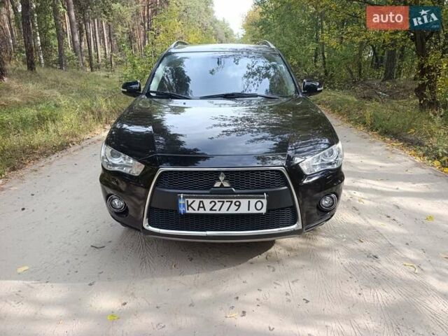Чорний Міцубісі Аутлендер ХЛ, об'ємом двигуна 2.4 л та пробігом 175 тис. км за 10800 $, фото 13 на Automoto.ua