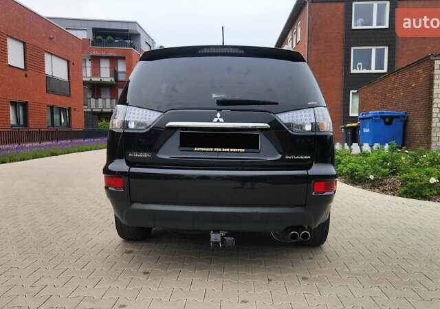 Мицубиси Аутлендер ХЛ 2010 в Днепре (Днепропетровске) на Automoto.ua Черный Мицубиси Аутлендер ХЛ, объемом двигателя 2.3 л и пробегом 193 тыс. км за 14999 $, фото 5 на Automoto.ua