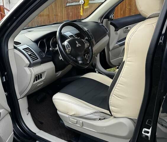 Черный Мицубиси Аутлендер ХЛ, объемом двигателя 2.2 л и пробегом 249 тыс. км за 11500 $, фото 6 на Automoto.ua