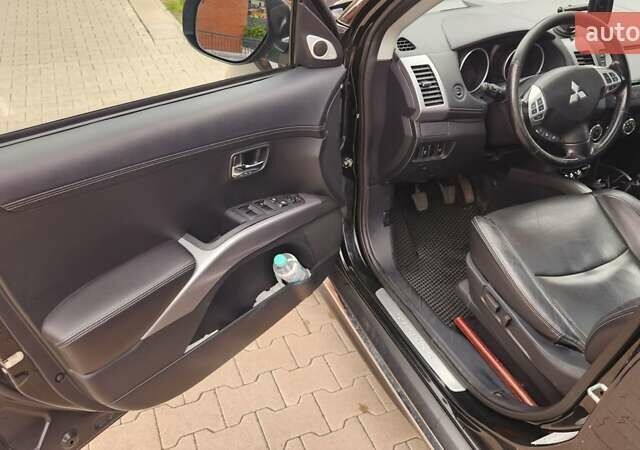 Мицубиси Аутлендер ХЛ 2010 в Днепре (Днепропетровске) на Automoto.ua Черный Мицубиси Аутлендер ХЛ, объемом двигателя 2.3 л и пробегом 193 тыс. км за 14999 $, фото 9 на Automoto.ua