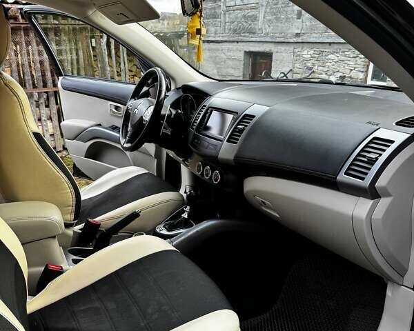 Черный Мицубиси Аутлендер ХЛ, объемом двигателя 2.2 л и пробегом 249 тыс. км за 11500 $, фото 3 на Automoto.ua