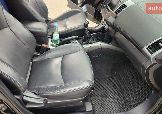 Мицубиси Аутлендер ХЛ 2010 в Днепре (Днепропетровске) на Automoto.ua Черный Мицубиси Аутлендер ХЛ, объемом двигателя 2.3 л и пробегом 193 тыс. км за 14999 $, фото 12 на Automoto.ua