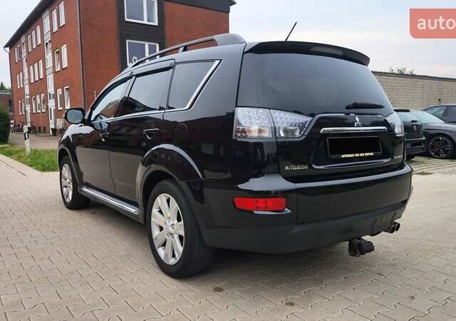 Мицубиси Аутлендер ХЛ 2010 в Днепре (Днепропетровске) на Automoto.ua Черный Мицубиси Аутлендер ХЛ, объемом двигателя 2.3 л и пробегом 193 тыс. км за 14999 $, фото 6 на Automoto.ua