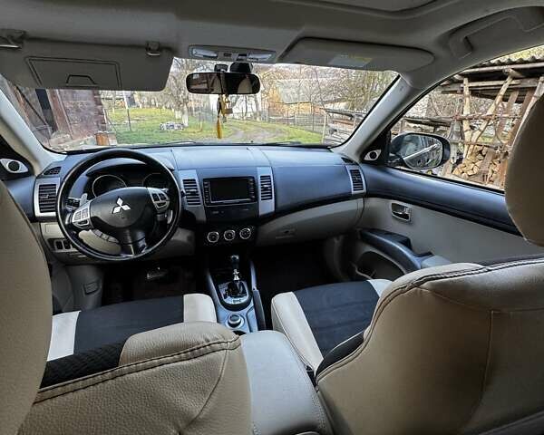 Черный Мицубиси Аутлендер ХЛ, объемом двигателя 2.2 л и пробегом 249 тыс. км за 11500 $, фото 11 на Automoto.ua