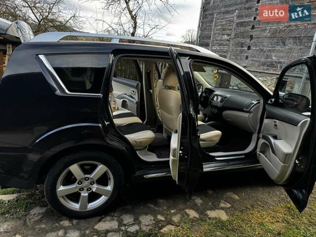 Черный Мицубиси Аутлендер ХЛ, объемом двигателя 2.2 л и пробегом 249 тыс. км за 11500 $, фото 2 на Automoto.ua