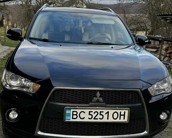 Черный Мицубиси Аутлендер ХЛ, объемом двигателя 2.2 л и пробегом 249 тыс. км за 11500 $, фото 1 на Automoto.ua