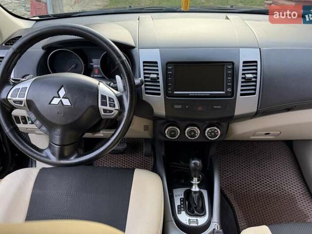 Черный Мицубиси Аутлендер ХЛ, объемом двигателя 2.2 л и пробегом 249 тыс. км за 11500 $, фото 17 на Automoto.ua