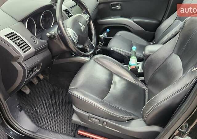 Мицубиси Аутлендер ХЛ 2010 в Днепре (Днепропетровске) на Automoto.ua Черный Мицубиси Аутлендер ХЛ, объемом двигателя 2.3 л и пробегом 193 тыс. км за 14999 $, фото 10 на Automoto.ua