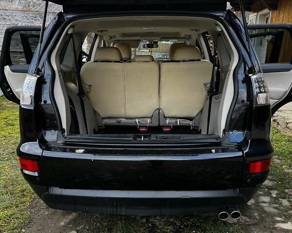 Черный Мицубиси Аутлендер ХЛ, объемом двигателя 2.2 л и пробегом 249 тыс. км за 11500 $, фото 4 на Automoto.ua