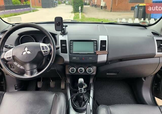 Мицубиси Аутлендер ХЛ 2010 в Днепре (Днепропетровске) на Automoto.ua Черный Мицубиси Аутлендер ХЛ, объемом двигателя 2.3 л и пробегом 193 тыс. км за 14999 $, фото 20 на Automoto.ua