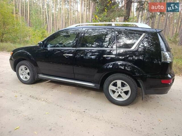 Чорний Міцубісі Аутлендер ХЛ, об'ємом двигуна 2.4 л та пробігом 175 тис. км за 10800 $, фото 4 на Automoto.ua