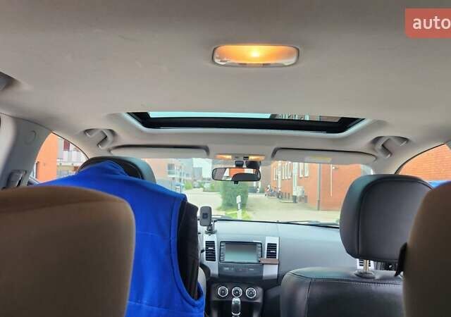 Мицубиси Аутлендер ХЛ 2010 в Днепре (Днепропетровске) на Automoto.ua Черный Мицубиси Аутлендер ХЛ, объемом двигателя 2.3 л и пробегом 193 тыс. км за 14999 $, фото 19 на Automoto.ua