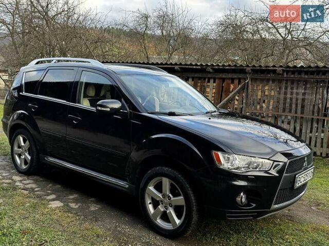 Черный Мицубиси Аутлендер ХЛ, объемом двигателя 2.2 л и пробегом 249 тыс. км за 11500 $, фото 16 на Automoto.ua