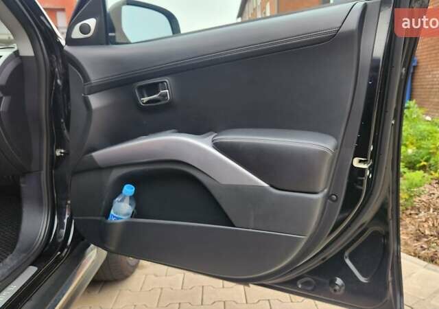 Мицубиси Аутлендер ХЛ 2010 в Днепре (Днепропетровске) на Automoto.ua Черный Мицубиси Аутлендер ХЛ, объемом двигателя 2.3 л и пробегом 193 тыс. км за 14999 $, фото 11 на Automoto.ua