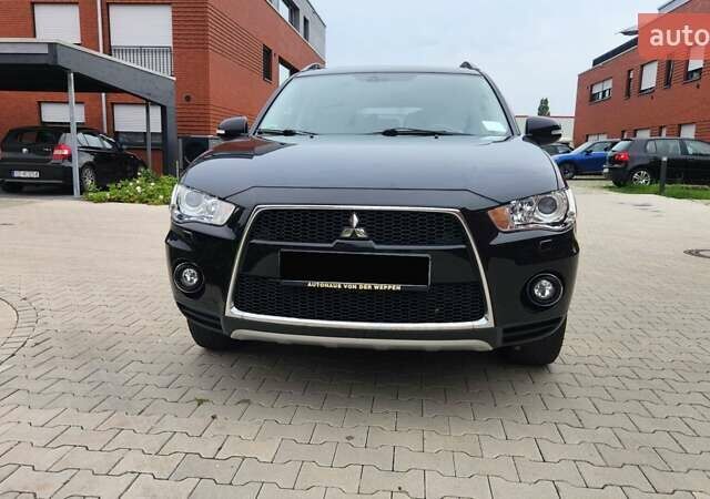 Мицубиси Аутлендер ХЛ 2010 в Днепре (Днепропетровске) на Automoto.ua Черный Мицубиси Аутлендер ХЛ, объемом двигателя 2.3 л и пробегом 193 тыс. км за 14999 $, фото 1 на Automoto.ua