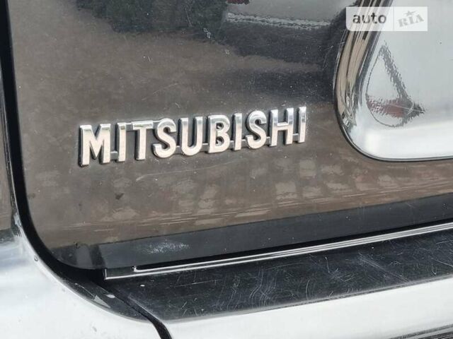 Чорний Міцубісі Аутлендер ХЛ, об'ємом двигуна 2 л та пробігом 186 тис. км за 10600 $, фото 64 на Automoto.ua