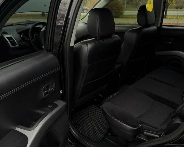 Черный Мицубиси Аутлендер ХЛ, объемом двигателя 2.18 л и пробегом 253 тыс. км за 12500 $, фото 24 на Automoto.ua