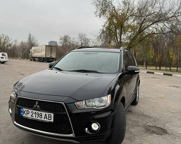 Черный Мицубиси Аутлендер ХЛ, объемом двигателя 2.18 л и пробегом 253 тыс. км за 12500 $, фото 16 на Automoto.ua