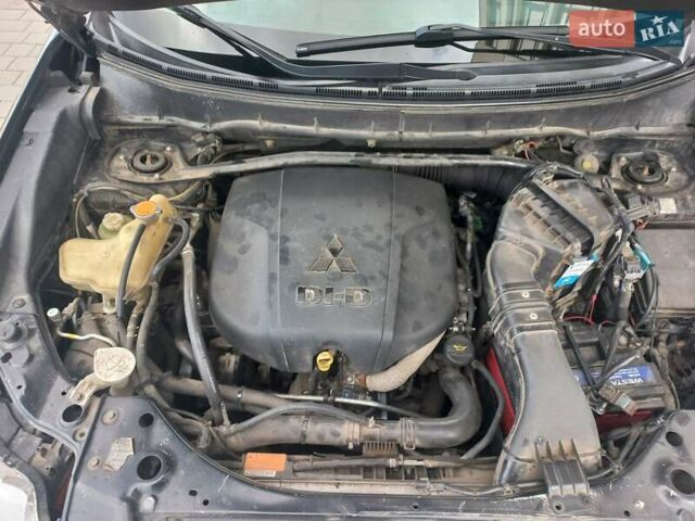 Черный Мицубиси Аутлендер ХЛ, объемом двигателя 2.2 л и пробегом 232 тыс. км за 11600 $, фото 1006 на Automoto.ua