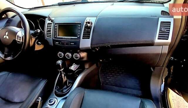 Черный Мицубиси Аутлендер ХЛ, объемом двигателя 2.3 л и пробегом 190 тыс. км за 12500 $, фото 18 на Automoto.ua