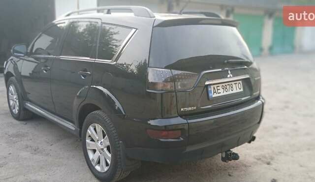 Черный Мицубиси Аутлендер ХЛ, объемом двигателя 2.3 л и пробегом 190 тыс. км за 12500 $, фото 4 на Automoto.ua