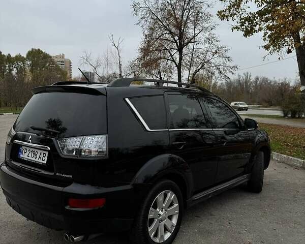 Черный Мицубиси Аутлендер ХЛ, объемом двигателя 2.18 л и пробегом 253 тыс. км за 12500 $, фото 9 на Automoto.ua