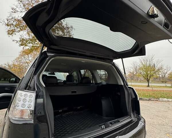 Черный Мицубиси Аутлендер ХЛ, объемом двигателя 2.18 л и пробегом 253 тыс. км за 12500 $, фото 10 на Automoto.ua