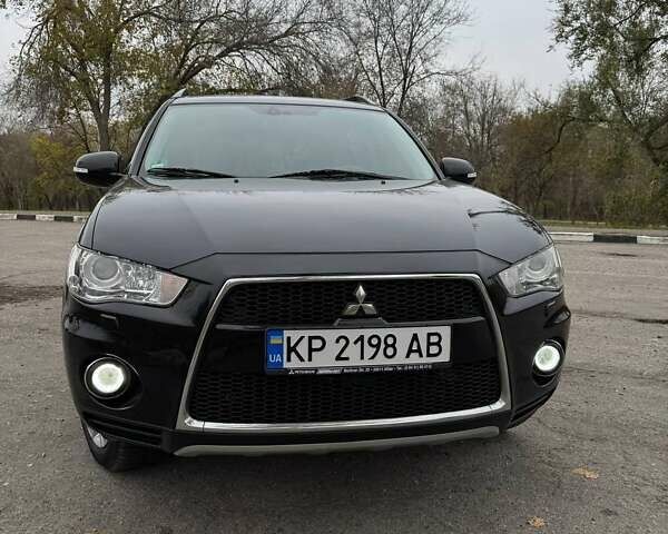 Черный Мицубиси Аутлендер ХЛ, объемом двигателя 2.18 л и пробегом 253 тыс. км за 12500 $, фото 14 на Automoto.ua