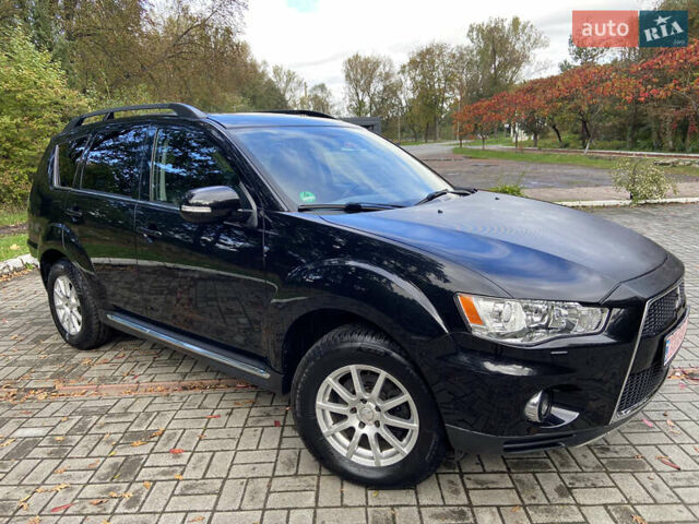 Черный Мицубиси Аутлендер ХЛ, объемом двигателя 2.2 л и пробегом 138 тыс. км за 12250 $, фото 4 на Automoto.ua