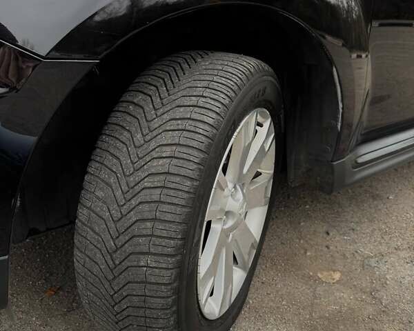 Черный Мицубиси Аутлендер ХЛ, объемом двигателя 2.18 л и пробегом 253 тыс. км за 12500 $, фото 15 на Automoto.ua