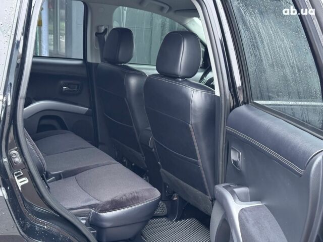 Чорний Міцубісі Аутлендер ХЛ, об'ємом двигуна 2.2 л та пробігом 253 тис. км за 12490 $, фото 11 на Automoto.ua