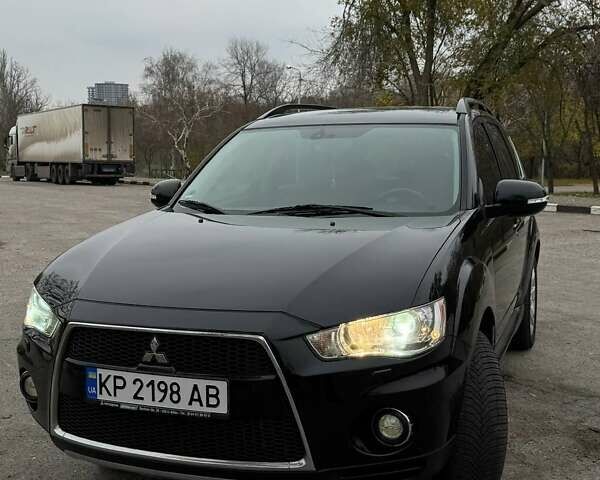 Черный Мицубиси Аутлендер ХЛ, объемом двигателя 2.18 л и пробегом 253 тыс. км за 12500 $, фото 19 на Automoto.ua