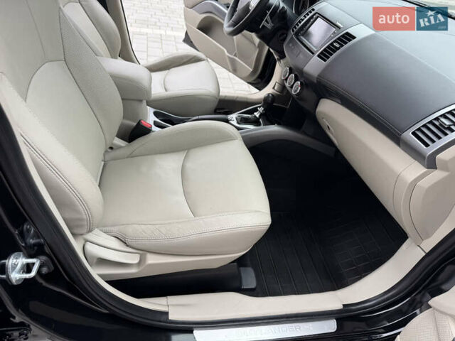 Чорний Міцубісі Аутлендер ХЛ, об'ємом двигуна 2.2 л та пробігом 155 тис. км за 12299 $, фото 63 на Automoto.ua