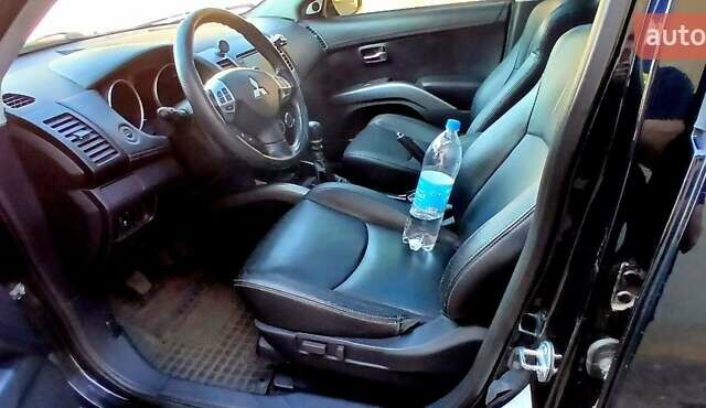 Черный Мицубиси Аутлендер ХЛ, объемом двигателя 2.3 л и пробегом 190 тыс. км за 12500 $, фото 15 на Automoto.ua