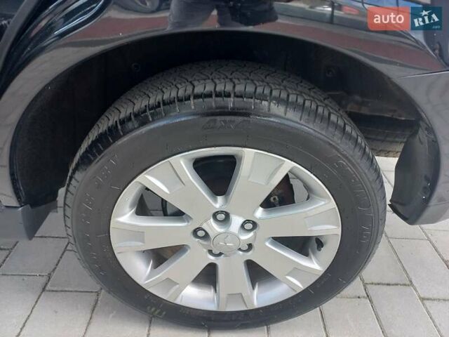 Черный Мицубиси Аутлендер ХЛ, объемом двигателя 2.2 л и пробегом 232 тыс. км за 11600 $, фото 1356 на Automoto.ua