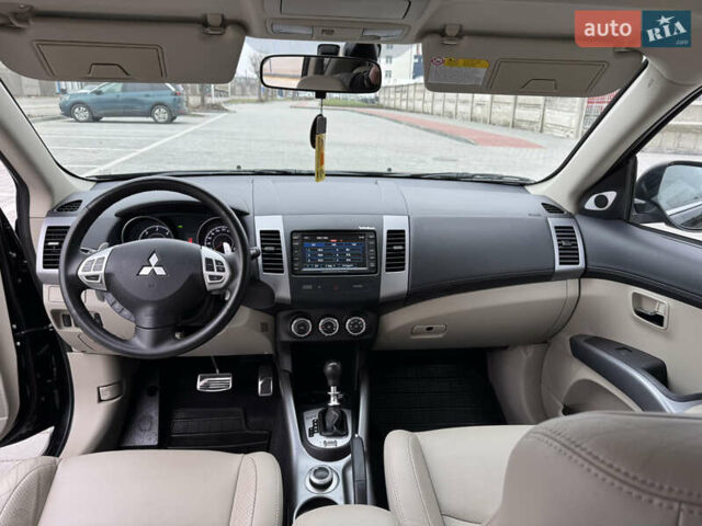 Чорний Міцубісі Аутлендер ХЛ, об'ємом двигуна 2.2 л та пробігом 155 тис. км за 12299 $, фото 53 на Automoto.ua