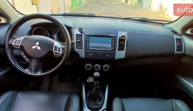 Черный Мицубиси Аутлендер ХЛ, объемом двигателя 2.3 л и пробегом 190 тыс. км за 12500 $, фото 21 на Automoto.ua