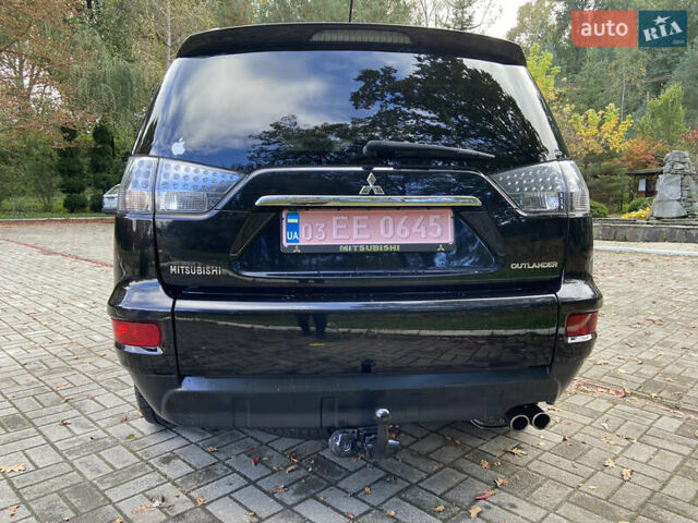 Черный Мицубиси Аутлендер ХЛ, объемом двигателя 2.2 л и пробегом 138 тыс. км за 12250 $, фото 13 на Automoto.ua