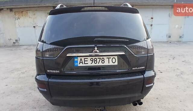Черный Мицубиси Аутлендер ХЛ, объемом двигателя 2.3 л и пробегом 190 тыс. км за 12500 $, фото 7 на Automoto.ua