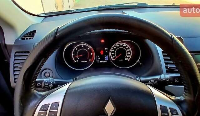 Черный Мицубиси Аутлендер ХЛ, объемом двигателя 2.3 л и пробегом 190 тыс. км за 12500 $, фото 23 на Automoto.ua